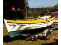 Unknown Lifeboat converted to gaff-rigged sailboat Click to launch Larger Image