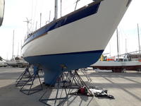 Slocum 43 Cutter aft cockpit with boom furler Click to launch Larger Image