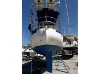Slocum 43 Cutter aft cockpit with boom furler Click to launch Larger Image