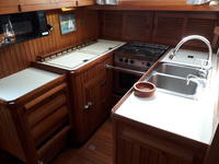 Slocum 43 Cutter aft cockpit with boom furler Click to launch Larger Image