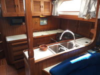 Slocum 43 Cutter aft cockpit with boom furler Click to launch Larger Image